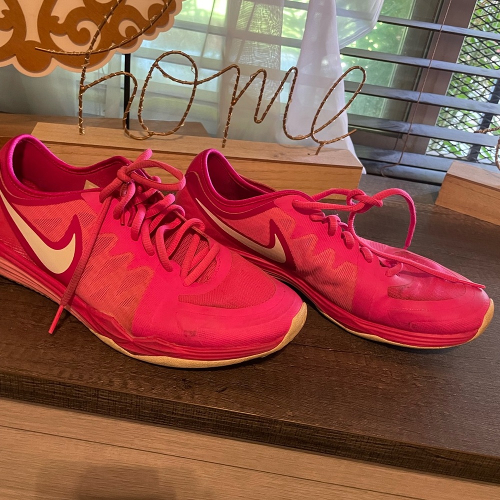 Hot pink Nike shoes